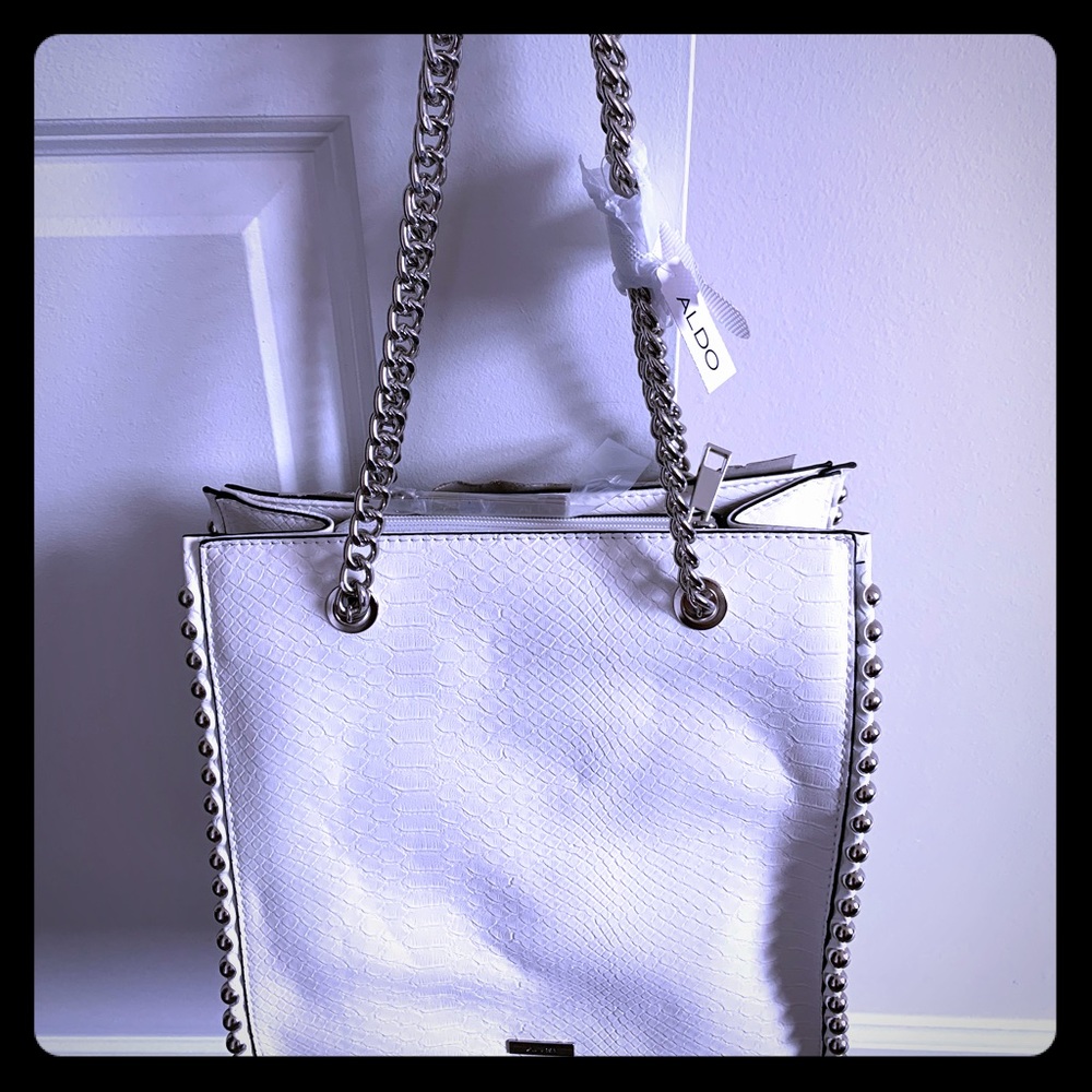 White handbag with silver accessories